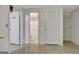 Hallway in basement leading to bathroom at 323 Newfield Way, Peachtree City, GA 30269