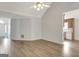 Spacious living area featuring hardwood floors, natural light, and open layout at 323 Newfield Way, Peachtree City, GA 30269
