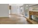 Open-concept living room that flows seamlessly into kitchen and dining area at 323 Newfield Way, Peachtree City, GA 30269