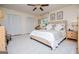 Large bedroom with neutral décor, bright windows, and plenty of closet space for storage at 527 W Church St, Villa Rica, GA 30180