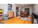 Charming dining room with hardwood floors, ample seating, and a seamless flow to the kitchen at 527 W Church St, Villa Rica, GA 30180