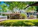 Charming home featuring a carport, and a lush front lawn at 527 W Church St, Villa Rica, GA 30180