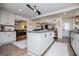 Bright kitchen with white cabinets, an island, and stainless steel appliances at 527 W Church St, Villa Rica, GA 30180
