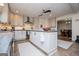 Modern kitchen with gray cabinets, a center island, and stainless steel appliances at 527 W Church St, Villa Rica, GA 30180