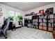 Office space with built in storage, and light from a bright window overlooking trees at 527 W Church St, Villa Rica, GA 30180