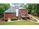 Expansive backyard featuring a deck and a well-manicured lawn at 119 Crown Springs Dr, Mcdonough, GA 30252