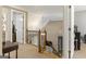 Hallway features wooden railing and staircase, and access to multiple rooms at 119 Crown Springs Dr, Mcdonough, GA 30252