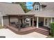 Aerial view of a wooden deck with pergola that features stylish outdoor seating, offering a perfect blend of luxury and relaxation at 411 Hampton Rd, Fayetteville, GA 30215