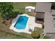 Large backyard with in-ground pool, diving board, deck, and outbuilding at 411 Hampton Rd, Fayetteville, GA 30215