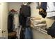 Well-organized closet space with shelving and hanging storage solutions at 411 Hampton Rd, Fayetteville, GA 30215