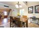 Dining room with wooden table, chairs and chandelier lighting at 411 Hampton Rd, Fayetteville, GA 30215