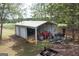 Garage with multiple bays perfect for storing your farm equipment at 411 Hampton Rd, Fayetteville, GA 30215