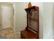 Hallway featuring a wooden bench with hooks on a stone floor at 411 Hampton Rd, Fayetteville, GA 30215