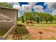 Horses grazing in a large pasture with a rustic wooden fence at 411 Hampton Rd, Fayetteville, GA 30215
