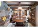 Rustic recreation room with leather chairs, barrel table, and unique decor at 411 Hampton Rd, Fayetteville, GA 30215