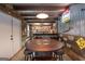 Recreation room with rustic details, a round table, and a bar area at 411 Hampton Rd, Fayetteville, GA 30215