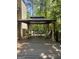 Relaxing gazebo with seating, curtains, and a view of the backyard at 2074 Ayers Creek Ct, Villa Rica, GA 30180