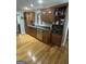 Functional kitchen with stainless steel appliances, dark countertops, and ample cabinet space at 2074 Ayers Creek Ct, Villa Rica, GA 30180