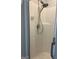 A modern shower features a sleek showerhead and easy-to-clean walls at 2074 Ayers Creek Ct, Villa Rica, GA 30180