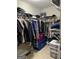 Functional walk-in closet features wire shelving with ample storage space at 2074 Ayers Creek Ct, Villa Rica, GA 30180