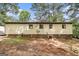 Backyard showing the exterior of the home at 6109 Oakwood Sw Cir, Covington, GA 30014