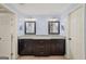 Elegant bathroom features dual sinks, granite countertops, and high-end fixtures for a luxurious feel at 1212 Lee Whatley Dr, Lithonia, GA 30058