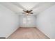 Bedroom with carpet, featuring a ceiling fan and natural light from a window, cozy and inviting at 1212 Lee Whatley Dr, Lithonia, GA 30058