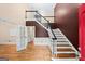 Elegant foyer with hardwood floors, staircase, and french doors, showcasing classic design at 1212 Lee Whatley Dr, Lithonia, GA 30058