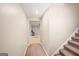 Hallway with stairs leading to a potential workspace at 1212 Lee Whatley Dr, Lithonia, GA 30058