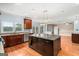 Kitchen with granite countertops and spacious island overlooking the living space at 1212 Lee Whatley Dr, Lithonia, GA 30058