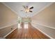 Expansive living room featuring hardwood floors and abundant natural light at 1212 Lee Whatley Dr, Lithonia, GA 30058