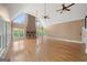 Bright and airy living room with a stone fireplace and lots of windows at 1212 Lee Whatley Dr, Lithonia, GA 30058