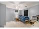 Comfortable carpeted bedroom with ceiling fan and single window providing natural light at 1125 Babbs Mill Rd, Hampton, GA 30228