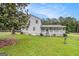 Beautiful two-story home featuring a spacious yard, inviting porch, and a classic, well-maintained exterior at 1125 Babbs Mill Rd, Hampton, GA 30228
