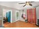 Inviting living room with hardwood floors, and a view into the dining room at 1125 Babbs Mill Rd, Hampton, GA 30228