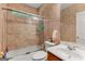 Bathroom features decorative ceramic tiled shower and white sink and toilet at 2294 Hollonville Rd, Brooks, GA 30205