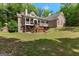 Stunning brick home with a covered porch perfect for outdoor entertaining at 2294 Hollonville Rd, Brooks, GA 30205