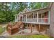 Lower level patio and upper level deck, perfect for entertaining and relaxation at 2294 Hollonville Rd, Brooks, GA 30205