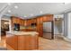Open kitchen with granite countertops, stainless steel appliances, and wood cabinetry at 2294 Hollonville Rd, Brooks, GA 30205