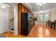 The kitchen features wood cabinets, stone countertops, and stainless steel appliances at 2294 Hollonville Rd, Brooks, GA 30205