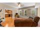 Cozy living room area with open view to kitchen and large windows for lots of natural light at 2294 Hollonville Rd, Brooks, GA 30205