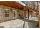 Covered patio with stone flooring and ample space for outdoor seating at 2294 Hollonville Rd, Brooks, GA 30205