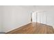 Neutral bedroom with laminate flooring, closet, and natural light at 3652 Platina Park Ct, Decatur, GA 30034