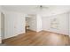 Large bedroom featuring light wood floors, a ceiling fan, and a makeup vanity area at 3652 Platina Park Ct, Decatur, GA 30034