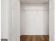 Walk-in closet featuring light wood floors and wire shelving at 3652 Platina Park Ct, Decatur, GA 30034