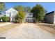 Traditional two-story home with a long driveway and mature landscaping, offering curb appeal and outdoor space at 3652 Platina Park Ct, Decatur, GA 30034