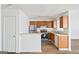 Functional kitchen features stainless steel appliances, wood cabinets, and an open layout for easy meal preparation at 3652 Platina Park Ct, Decatur, GA 30034