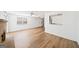 Open living area showcasing laminate floors, neutral paint, fireplace, and staircase access for relaxed living at 3652 Platina Park Ct, Decatur, GA 30034