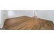 Open-concept living area featuring laminate flooring, white trim, and an inviting layout for easy living and entertaining at 3652 Platina Park Ct, Decatur, GA 30034
