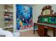 Vintage styled bathroom featuring fish themed shower curtain, vanity, and built in shelves at 3258 South Mckoy Rd, Villa Rica, GA 30180